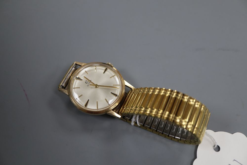 A gentlemans 1960s? 9ct gold Cyma manual wind wrist watch, on later associated bracelet.